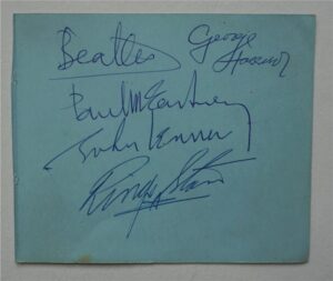 AP2. A Magnificent Blue Autograph Album Page Signed By The Beatles