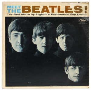 The front of this amazing signed "Meet The Beatles" album cover.