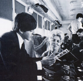 Here is Paul signing this very album for Louise Harrison on the way to Washington D.C. on February 11, 1964.
