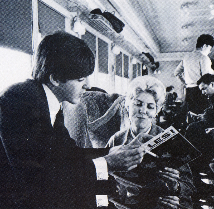 PaulMcCartneySigningMEETTHEBEATLES Here is Paul signing this very album for Louise Harrison on the way to Washington D.C. on February 11, 1964.