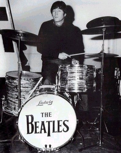 John Lennon playing Ringo's drumset with Drumhead No. 4