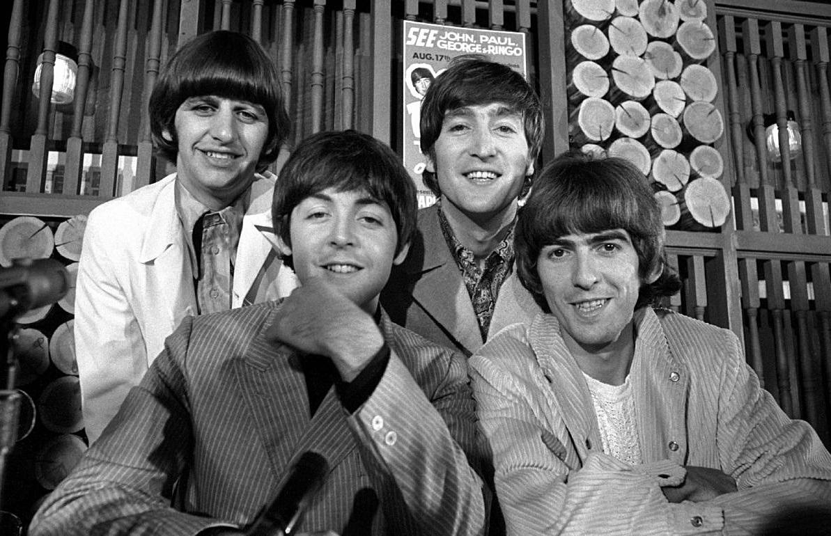 Press Conference Toronto August 17, 1966 The Beatles in a smiling pose at their press conference in Toronto on August 17, 1966.