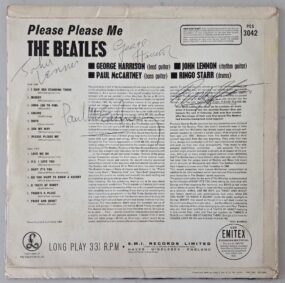 An EXTREMELY RARE Please Please Me First Pressing Black & Gold Label STEREO Album Cover Autographed By The Beatles Shortly After Release