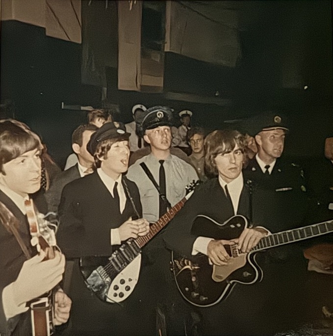 The Senior Officer with the Metropolitan Toronto Police Department who got this 1966 autograph set is pictured here with The Beatles exactly one year to the day before, on August 17, 1965, when they performed live in concert at Maple Leaf Gardens. He is to the right of George Harrison, wearing the dark suit. He was in charge of the safety of The Beatles there in Toronto for 3 consecutive years: 1964, 1965 and 1966.